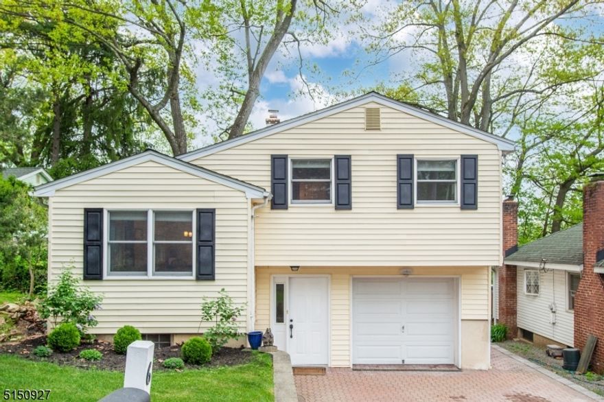 Indian Lake living w/seasonal lake views. Immaculately Maintained Split located just up the street from Lake access, boat ramp & Estling Lake waterfall. Lots of Generous Room Sizes to Spread Out & Make Your Own! Beautiful HW Floors throughout. Bright, sunny & OPEN living space. 1st Floor Offers formal LR w/gorgeous white washed shiplap, dining area & kitchen w/new granite counters & white cabinets. Upstairs, a renovated ceramic bath & 3 nice-sized bdrms, generous closet space in each. Downstairs, a convenient powder room & access to the backyard. Large family room in the basement, perfect for entertaining! Bonus storage space w/laundry in addition to the 1 car garage. Outside, an ideal spot to relax & enjoy life. Leveled lawn, mature trees & paver patio. Enjoy all the amenities of Indian Lake w/optional membership. Beaches, clubhouse, boating, fishing, swimming, ice-skating, etc. Easy Access to all Major Highways, NYC-Direct Train Station and Bus Stops and the Bustling Denville Town Center - Restaurants, Shopping.