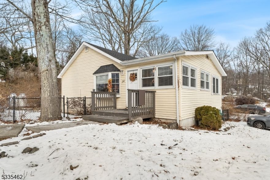 Enjoy this sunny and inviting 3-bedroom Ranch-style home located just moments from Lake Hopatcong and the private 'Beach at Crescent Cove' community swimming club.  This move-in-ready 'condo alternative'  offers one floor living with comfort, updates, and a convenient open floorplan, all without costly HOA fees. This home features an Eat-In Kitchen boasting plenty of cabinet storage, granite countertops, stainless steel appliances and a stylish tile backsplash. The Living/Dining Room combo creates a bright, open-concept living space, highlighted by gorgeous hardwood floors. Updated (2022) bathroom.   Maintenance free vinyl siding and energy efficient vinyl windows throughout. Stacking washer/dryer included. New Hot Water Heater (2025), Newer HVAC (2022 for both heat & cool) systems, along with an added ceiling fan for extra comfort. The roof is approximately 10 years old. This home also offers plenty of potential for future expansion.  Hopatcong is close to major roadways including Interstate 80 & Route 46 & 183, providing convenient access to points throughout New Jersey and New York.  Enjoy an exceptional lifestyle centered around the beauty and activities of New Jersey's largest freshwater lake. Whether you're drawn by its outdoor recreation, lakefront living, or sense of community, Lake Hopatcong is the perfect place to call home. This one won't last.
