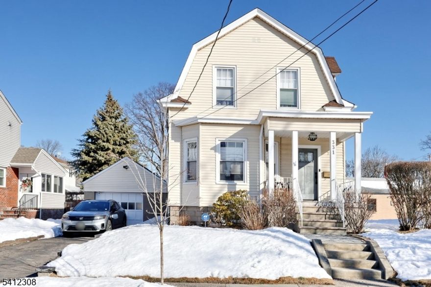 Welcome to this well maintained 2 BR, 1 1/2 bath classic colonial offering comfortable living space with a mix of character and updates. Enjoy an inviting front porch with a craftsman front door. 1st floor features an entry foyer leading to living room, spacious dining room, updated kitchen with granite countertops, powder room and door to backyard. Hardwood floors, recessed lighting. Perfect for everyday living and entertaining.  2nd floor has two nice size bedrooms and a large full bath. The finished basement adds flexible space for a recreation room, home office or workout area, laundry area and walk out to backyard. Enjoy a beautiful fenced in yard with a new paver patio and storage shed. Ideal for relaxing and enjoying a nice barbecue. Central air, 1 car garage and an EV charger. A wonderful opportunity to own a home and enjoy great outdoor space. Close to schools, shopping, dining, parks and NYC transportation.  A must see home!