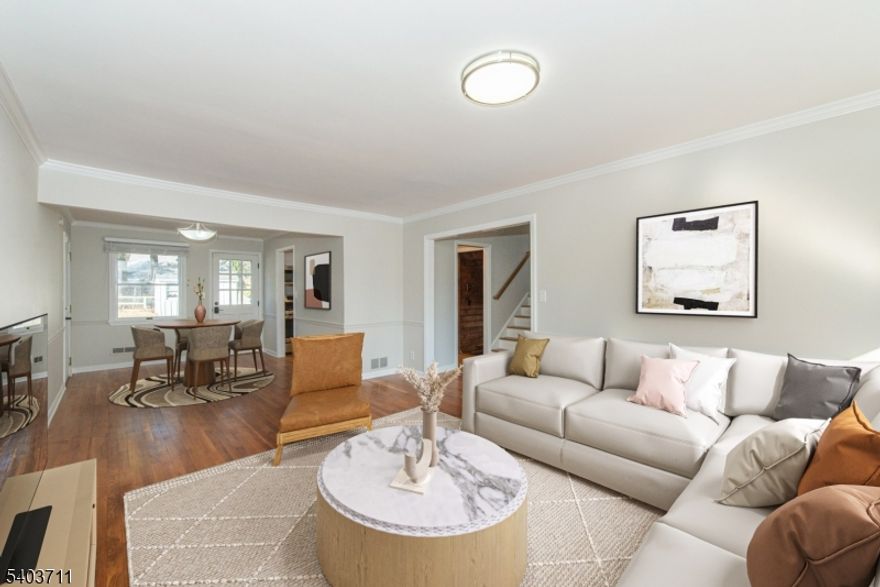 Located in Morris Township this beautiful home is located in a quiet neighborhood while still being close to 24, 287 & 10. An abundance of natural light floods the interior of this home.  The open concept living and dining rooms lead into an all white kitchen.  A few steps down lead to a massive family room with a wood burning fireplace and access to laundry, a half bath & tons of storage, a huge backyard & private patio. On the second floor you will find 3 spacious bedrooms with generous closet space and a full bathroom. Head up one more floor to see a spacious bedroom with a deep closet and a stylish full bath.  Every room has been freshly painted and there are hardwood floors primarily throughout the home.