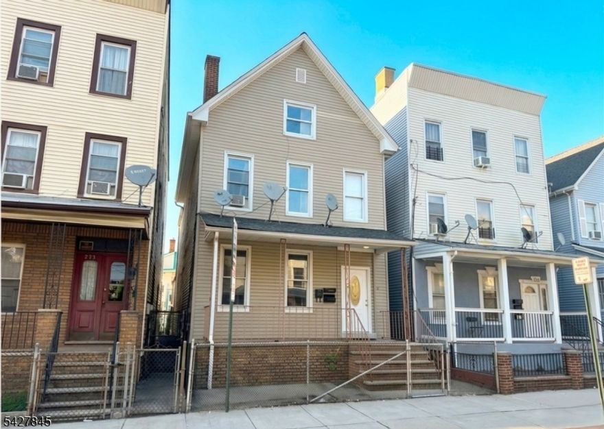 Incredible two-family investment opportunity located on a quiet cul-de-sac in the heart of Elizabeth. This top-bottom style property features two spacious units, each providing 3 bedrooms and 1 full bathroom. The first-floor unit offers a functional layout with a living room, formal dining room, and an eat-in kitchen. The second-floor unit includes a living room and kitchen. Significant additional utility is provided by a finished attic and a partially finished basement. The property also includes access to a yard for outdoor use. Ideally situated near local schools, parks, shopping, and public transportation for a seamless commute. Please note: the second-floor unit is currently occupied and will not be delivered vacant.