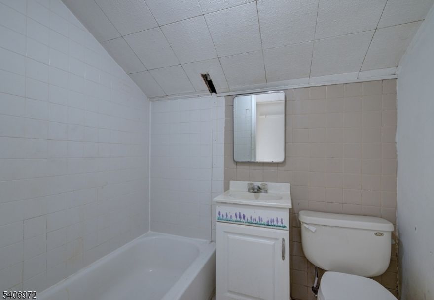 Amazing opportunity to modernize this mother-daughter house and make it your home! The ground level was once used as a doctors professional office and now features 2 separate entrances, separate kitchens, bathrooms & bedrooms. Located at the border of Livingston and down the street from Cooperman Barnabas Medical Center, public transportation into NYC, houses of worship and 3 separate downtown shopping corridors. Opportunity knocks at this prime location home!