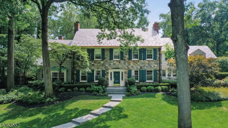 One of a kind Westfield Estate. Majestically set on a .85 acre of park-like property in picturesque Indian Forest, this stately 1933 Center Hall Colonial underwent a meticulously planned and executed "to the studs" renovation by its current Owners in 2004, which seamlessly blended the architectural grandeur and craftmanship of the original design with the amenities of modern living, resulting in a home of unmatched elegance, sophistication and warmth. The exquisitely detailed living space in this residential masterpiece offers large rooms framed by beautiful windows and natural light which, combined with a masterful interior lighting design, highlight the subtle beauty of each room and invite special moments with loved ones as well as grand-scale entertaining. Featuring a grand staircase, custom millwork throughout, four fireplaces, a gracious dining room with hand-painted mural, gourmet kitchen with state-of-the-art appliances, hand-crafted cabinetry and Noce limestone, richly paneled library, home office, well-appointed primary suite, luxurious bathrooms, mirrored exercise room, sweeping interior sight lines, manicured grounds, expansive bluestone patio and vine covered pergola, no detail was overlooked in reimagining this extraordinary residence to ensure comfort, functionality and convenience for today's discerning homeowner. Don't miss this once in a lifetime opportunity to own a home that truly captures the heart.