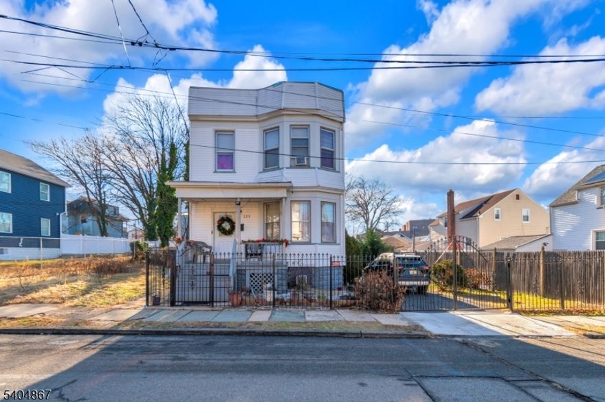 HIGHEST & BEST DUE 01/19/2026 AT NOON!!! Two-family home featuring a total of 4 bedrooms situated on a 47x100 lot on a quiet residential street. Property offers exclusive parking and is conveniently located between Route 78 and the Garden State Parkway, providing easy access for commuters. The basement is finished with a full bedroom and storage room. While the home requires TLC, it presents an excellent opportunity to renovate, rent at market value and add to an investment portfolio. Ideal for investors, 203k buyers, or buyers seeking their next income-producing property. Conveniently located and full of potential, this property is A MUST SEE!