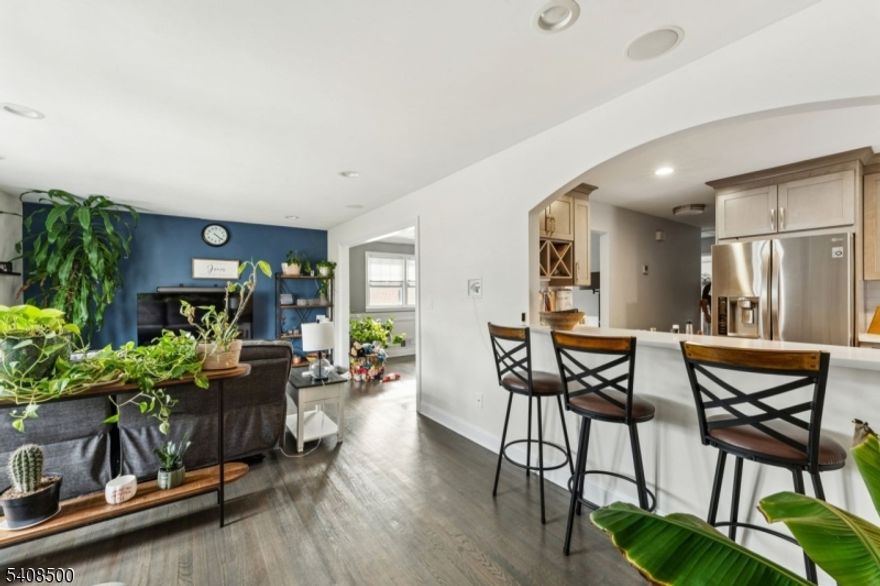 Welcome to this beautiful move-in ready Bi-level house in the heart of the desirable Sunnyside section of Linden. Come up the stairs to the welcoming foyer leading to the main floor which includes a spacious living room, dining room, and up-to-date kitchen with quartz countertops and stainless steel appliances. This floor also includes 3 spacious bedrooms and 2 full bathrooms, one of them being and en-suite off the main bedroom. Head downstairs to the ground level which features the spacious built-in double garage, a full bathroom, the family room, the fourth bedroom, and the utility/laundry room. The layout makes it convenient to be used as a mother-daughter suite. Head outside and enjoy the backyard with its patio and enclosed privacy fence perfect for relaxing, entertaining, and enjoying outdoor gatherings.