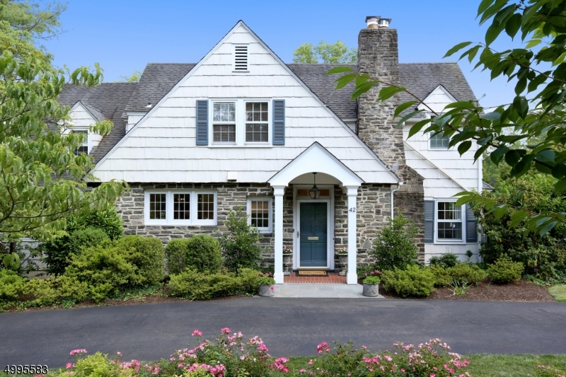 STUNNING, FULLY RENOVATED, WALK TO TOWN, SCHOOL AND TRAIN * Mint condition 5BR Colonial w/every possible upgrade. Elegant LR flows into gracious DR and FR w/ bay window. Brand new gourmet EIK w/center island, Danby Marble counters, Wolf 6-burner range and wall oven, SubZero and Marvel wine refrigerator. Mud room, pwdr rm  plus attached 2 car garage. Upstairs find luxe master BR w/ barrel vault ceiling, spa-like ensuite bath plus 4 more BRS & 2 more BTHS.  Room for all!  Finished basement with rec room, laundry & plenty of storage. Lovely fenced yard w/ brick patio, open lawns, professionally landscaped for privacy and fun outdoor play.  Circular drive in front plus driveway in rear. Gorgeous property, best neighborhood & walk to everything!  Unpack your bags and move right in. This will not last.