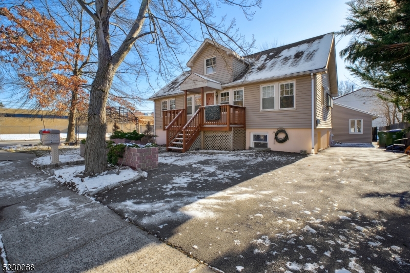 Don't miss the opportunity to call this beautifully renovated house your home! This 4-bedroom, 2.5-bathroom gem boasts stunning hardwood floors, a spacious kitchen with ample cabinetry, and modernized bathrooms. New central air! Outside, a fenced yard and patio provide the perfect setting for relaxation or entertaining. The garage has been converted into an impressive entertainment space with dedicated electric service and plenty of storage. The finished basement adds even more value with a half bathroom, a workshop, and additional storage. Nestled in a picturesque neighborhood with top-rated schools, this home is conveniently close to shops, restaurants, and the Edison train station. Enjoy nearby nature trails, parks, and easy access to major roadways, including the Turnpike, Route 18, Route 130, and Interstates 287/440. Don't let this incredible opportunity slip away!