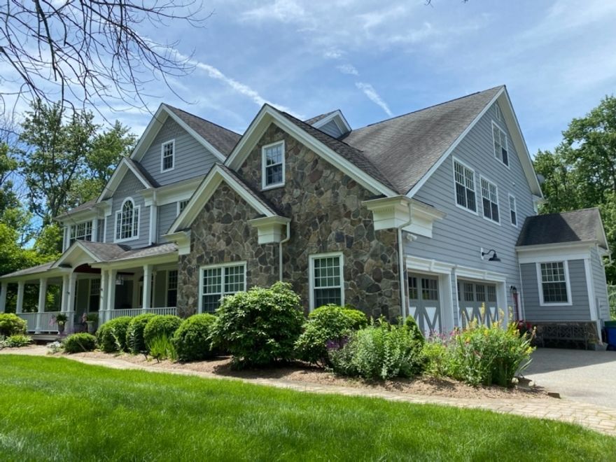 A combination of beauty and practicality is found in this Classic Colonial; set back on over 1.7 private acres in Mendham Borough. Soak in sunrise views on the wraparound front porch or relax in the private hot tub. From the moment you enter the bright and spacious foyer, you are beckoned by the natural light that flows throughout the open concept first fl  Enjoy gatherings in a wide-open, generously sized living rm graced with a fireplace and a soaring vaulted ceiling. The dining rm offers space for a large seating table and the expanded gourmet chef kitchen offers granite countertops, center island seating, stainless steel appliances including a Subzero refrigerator, Thermador 6-burner stove, built-in double oven & microwave, custom cabinetry & pantry. Full finished basement along w/ game room, den, bedroom& custom wet bar. After using the home gym; use the basement full bath steam shower. Slip upstairs to the main level to find first fl bedroom with a full bath, convenient laundry room & mud rm leading out to a 3-car garage. Upstairs you will discover 4 more sunny & spacious bedrooms with generous closet space and bathrooms pleasingly custom renovated. The primary bedroom retreat boasts a gas fireplace, sitting rm/ dressing rm, complete with 2 walk-in closets, a primary bathroom shower & jetted tub, 2 sinks & powder rm. Dine al fresco on the deck leading to the heated in-ground pool made for summer fun. Sec Sys, Lawn irrigation sys. Private country living yet close to town