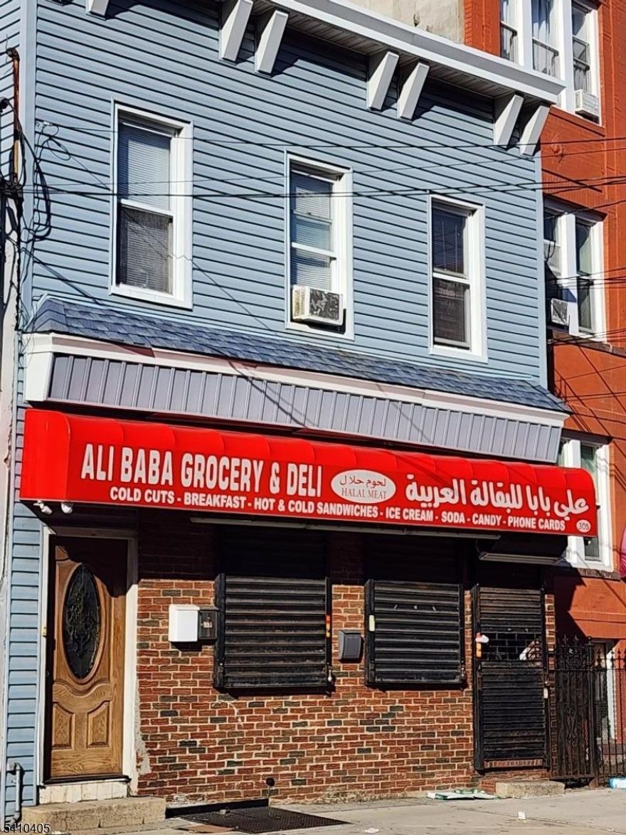 Mixed use property consisting of a store and 2 apartments. Near Journal Square path perfect for commuters and investors. Each apartment with 2 bedrooms, kitchen, living room and a full bathroom. Store has a half bathroom, central AC/forced hot air.