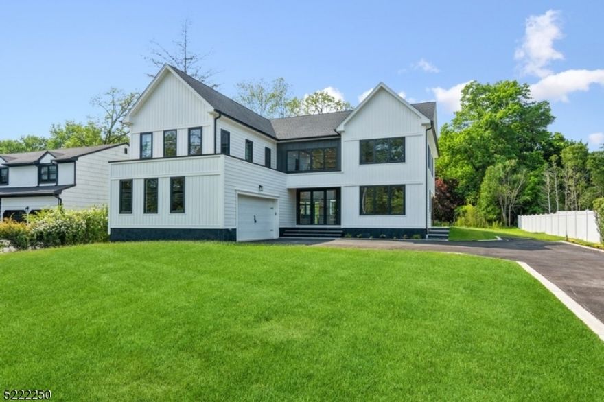 Introducing an exquisite high-end home that exemplifies luxury and elegance at its finest. As you step into the grand foyer, you are greeted by soaring ceilings, gleaming hardwood floors, and an abundance of natural light that accentuates the spaciousness of the home. The main living area features an open floor plan that seamlessly connects the living room, dining area, and gourmet kitchen. You can also find a powder room and a bedroom with full bath. The chef's kitchen is a culinary enthusiast's dream, boasting stainless steel appliances, custom cabinetry with two large islands and exquisite quartz countertops. A discreet doorway leads to the hidden butler pantry, perfect for organizational efficiency. Retreat upstairs to master suite that offers a generously sized bedroom and sitting area. The ensuite bathroom showcases a luxurious soaking tub, a walk-in shower and a double vanity. A walk-in closet completes the suite, providing ample storage space. Three additional bedrooms on the second floor, each with their own private full bathroom and spacious closets. The large laundry room upstairs was designed with convenience in mind with custom cabinetry and ample storage space. The basement provides a bedroom with walk in closet, a full bathroom and plenty of open space. Multiple French doors off the dining and living room lead to a seamless extension of the interior with three patios in which two are covered spaces, perfect for hosting or relaxation.