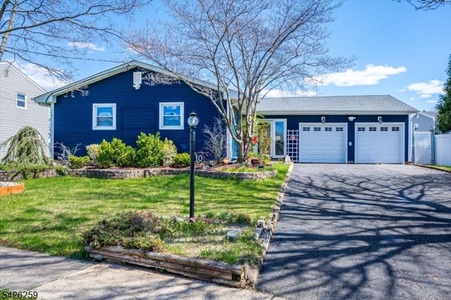 Welcome to 10 Wellington Ave in Port Reading, a beautiful custom ranch-style home offering 4 bedrooms and 2.1 bathrooms with a spacious, open-concept layout filled with natural light. The main level features hardwood floors and a sun-filled living room and family room, creating a warm and inviting atmosphere perfect for everyday living and entertaining. This home also includes a fully finished basement, ideal for extended space, storage and possibilities. A standout feature is the extra-wide 2 car garage with a driveway large enough 6+ cars, perfect for car enthusiasts, storage, or workshop use, along with a spacious driveway accommodating multiple vehicles. Conveniently located near local parks, schools, shopping, and dining, this home offers easy access to NJ Transit bus service and major commuter routes including the NJ Turnpike, Garden State Parkway, and Routes 1 & 9, making it ideal for New York commuters. This home combines suburban comfort with exceptional convenience don't miss this opportunity!