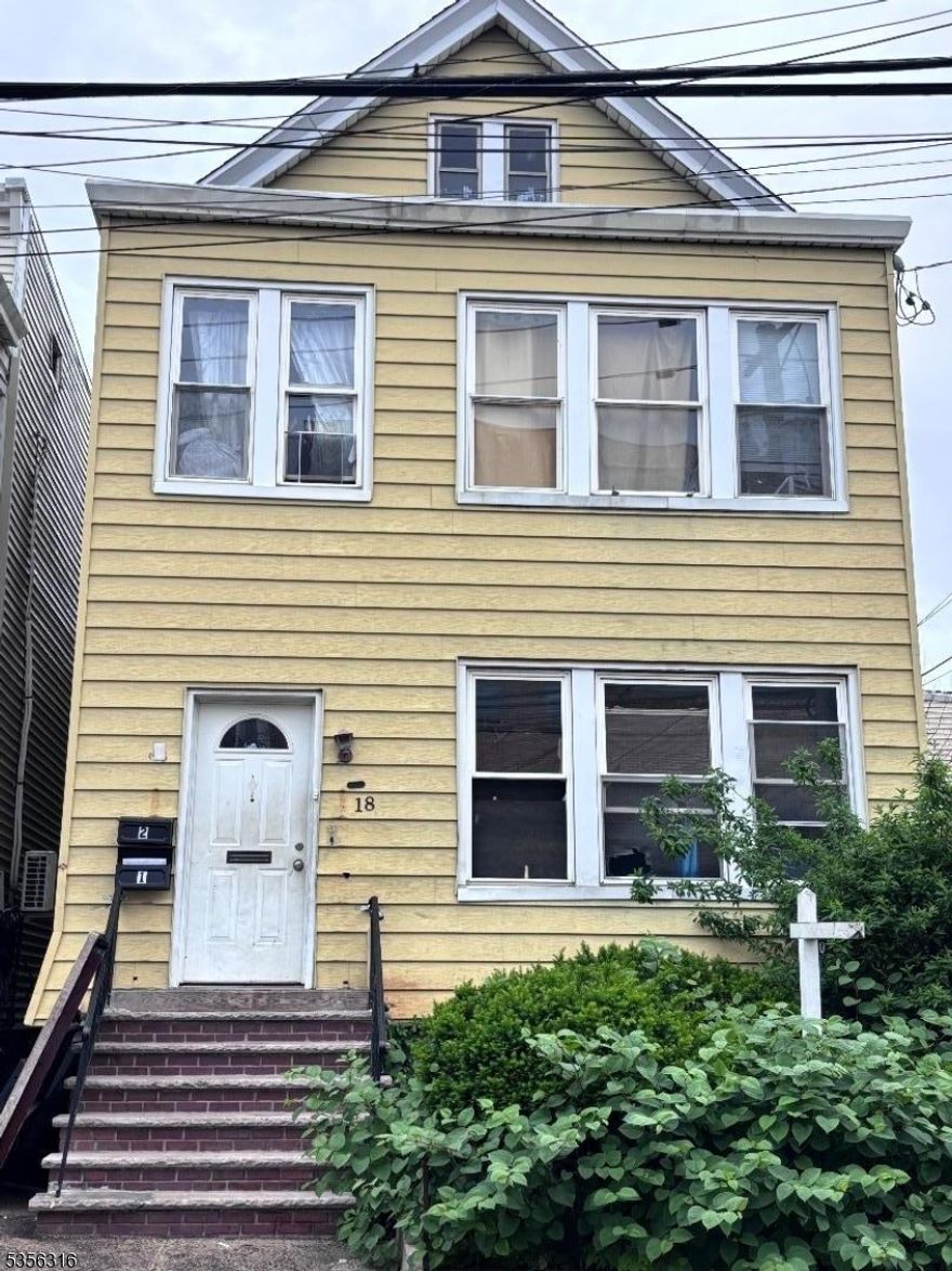 Great investment opportunity! Spacious two-family home renovated in 2021, featuring 7 bedrooms, 2 full baths, and a private backyard. Conveniently located near parks, schools, shopping centers, and offering an easy commute to NYC. Ideal for investors or owner-occupants.Short Sale " Sold Strictly As Is. Buyer is responsible for all inspections and certifications. Short Sale Approved, allowing for a smoother and quicker closing process.