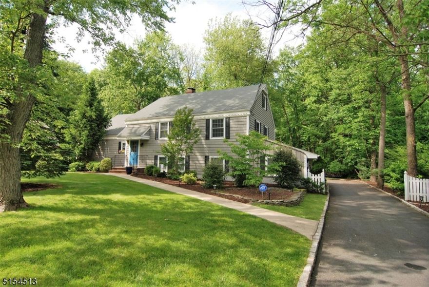 Curb appeal plus! Welcome to this lovely three bedroom (with walk up attic ready for additional master bedroom), 2 1/2 bath, two car garage Split level situated in the beautiful Cromwell Hills section of Convent Station.  Spacious Kitchen with extensive cabinetry, granite counters, stainless steel appliances and breakfast area; open to formal Dining Room and Living Room with wood burning fireplace and refinished hardwood oak - access to enclosed porch, deck and patio for privacy, serenity with professionally landscaped grounds.  Lower level features a 17x15 Family room with new hardwood floors - access to laundry room, powder room and rear of property and two car garage. Convenient access to Route 287, 24, 80 - with express transit to NYC.  Option to join Cromwell Hills community pool - also ball fields, parks and more!    Enjoy everything Morristown has to offer - restaurants, shopping, theatre, premier medical facilities - a community and lifestyle not to be missed!