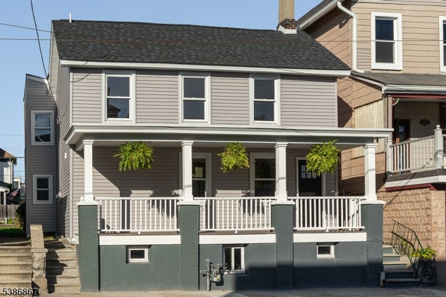 Move-in-ready 2025 remodel! 4 bedrooms, 2-CAR GARAGE, covered front porch with views of PA! Over 1600 sqft of living space. This 4-bedroom home has been thoughtfully updated with a new kitchen, bathrooms, new roof, siding, plumbing, electric, and much more. Just move in! The first floor features a bedroom and half bath, family room, formal dining room, and custom kitchen that opens to your own backyard and driveway. Upstairs find three generously sized bedrooms, a full bath, and an additional office/den area. Unfinished walk-up attic space holds potential for storage/usable space. Enjoy relaxing on the large front porch at sunset or spending time in a private backyard. Views of PA from from porch. A detached two-car garage can be used for parking or a workshop and the private driveway provides ample off-street parking.