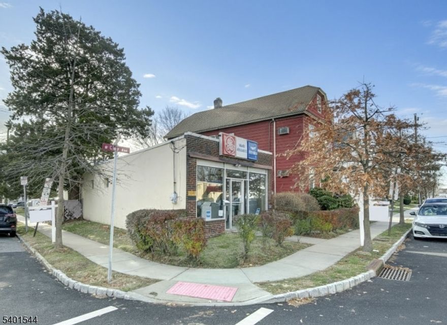 Unique Mixed-Use Opportunity with Exceptional Potential in Prime Location - There are 2 Properties on ONE lot. A commercial building on the corner of W Clay and Columbus with a 2 car garage behind it AND the red 2 family right next to it!!!!!!A truly rare offering on a 50' x 100' lot, this property presents an outstanding opportunity for investors, owner-occupants, or developers seeking flexibility and long-term value. The site features a single-story commercial building totaling approximately 1,200 square feet, along with a two-family residential home and a detached two-car garage all on one parcel.The first-floor unit offers two bedrooms, living room, kitchen, full bath, and a fully finished basement with kitchenette and full bath. The second-floor unit includes one bedroom plus office, large living room, kitchen, and walk-up attic for storage.Property is in need of updating, offering excellent value-add potential for investors or owner-users. Located less than one mile from the train station and close to major highways and transportation. DO NOT MISS!!!