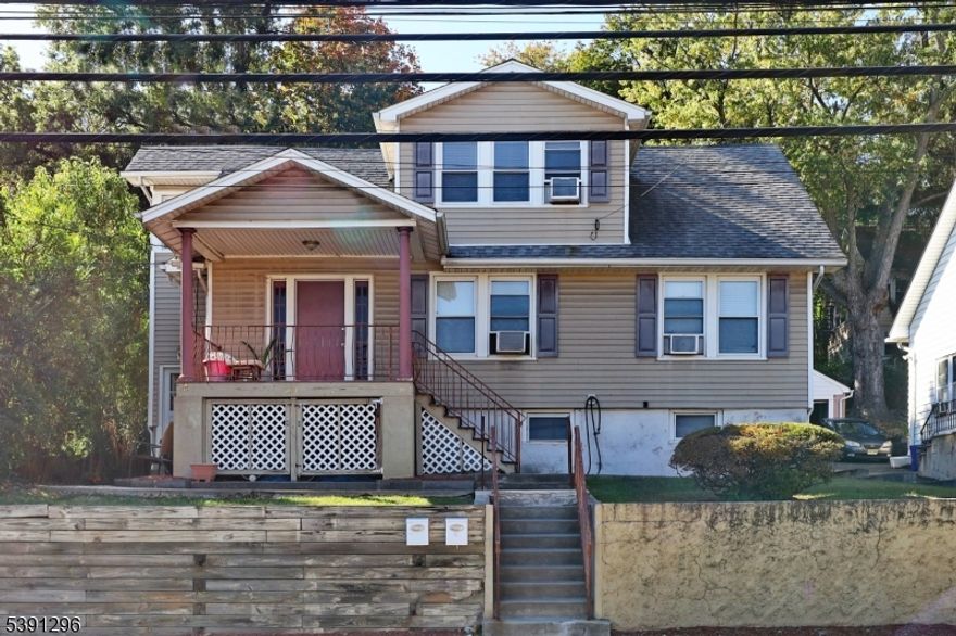 Beautiful Two-Family Home on an Oversized Lot in a Prime Location! This spacious and well-maintained two-family residence offers versatility, convenience, and excellent investment potential. The first-floor unit features two comfortable bedrooms, a full bathroom, an eat-in kitchen, and a bright living room. The finished basement adds bonus living space with a laundry area, multipurpose room, office/game room, and utilities. The second-floor unit, which will be delivered vacant, includes one bedroom, one bathroom, an eat-in kitchen, living room, and a storage area?ideal for an owner-occupant or additional rental income. Each unit has separate entrances and separate meters, ensuring privacy and efficiency. The property sits on a large oversized lot with ample parking, including parking in the rear accessible from a private side street, as well as additional parking spaces in front by the street and sidewalk on Goffle Road. Located in a high-demand neighborhood close to shopping, transportation, schools, and major highways, this property offers both comfort and future upside. Possible subdivision potential (buyer to conduct their own due diligence; no guarantees).