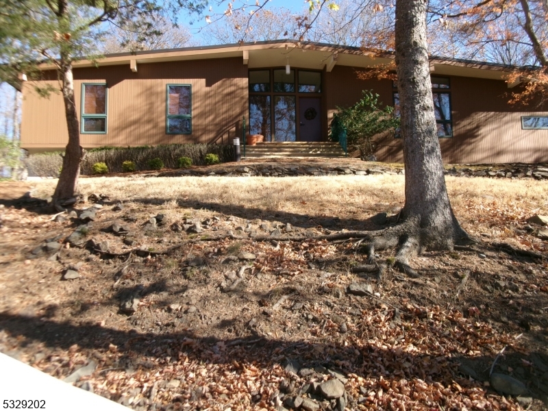 Looking for privacy  and a peaceful environment? Look no further ! This  Large expanded Ranch  is exactly what you are looking for. Enjoy the Bright  sunken living room with Cathedral ceiling and wood burning fireplace. The  Kitchen  also  features  a vaulted ceiling, a center Island and a separate dining area which opens out to the deck. Convenient for barbecuing. The dining room easily seats 12 with a side wet bar  with decorate sink. The family room opens out to the rear patio and pool area nestled in a woodsy setting.Showings begin On Saturday.