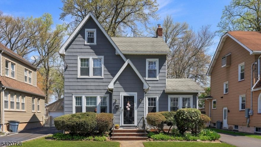 Nestled on a quiet, tree-lined street in Cranford's highly sought-after Brookside neighborhood, this classic 4-bedroom Colonial presents a rare opportunity to reimagine a home with timeless character and enduring appeal. A welcoming foyer introduces beautifully proportioned living spaces, including a sun-filled living room with fireplace, an elegant formal dining room, and a versatile den ideal for a home office or quiet retreat. The eat-in kitchen offers a functional footprint with excellent potential for customization and expansion.The second level features three bedrooms and a full bath, while the third floor (currently used as a fourth bedroom) provides a spacious flexible bonus space perfect for guests, a studio, or additional work-from-home needs. An unfinished basement with laundry, powder room, and outside access adds valuable utility and future finishing possibilities. Set on a generously sized lot, the property includes a detached two-car garage and a private backyard and patio ready to be transformed into your ideal outdoor setting. Ideally located just moments from Cranford's vibrant downtown, parks, top-rated schools, and NYC transportation, this is a compelling opportunity for buyers looking to bring vision and value to one of Cranford's most sought after neighborhoods.