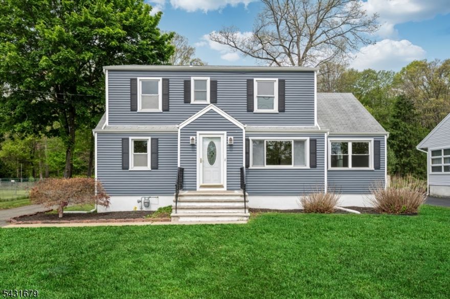 Discover the charm and surprising space of this expanded 5-bedroom, 2-bath Cape Cod, perfectly located just steps from Horseshoe Lake and Roxbury Recreation where playgrounds, walking paths, seasonal swimming, and endless outdoor fun are right at your fingertips. With 2308 sq ft, this home offers a flexible layout featuring 2 bedrooms on the main level and 3 bedrooms upstairs, all complemented by a full bath on each floor. The entire second floor features brand-new flooring, giving the upper level a fresh, modern feel. The main level includes a bright living room, dining room, and a cozy den/family room. From the kitchen's sliding doors, step onto your newer maintenance-free Trex deck, perfect for relaxing or entertaining. Recent updates include fresh interior paint, an updated electric panel, newer heating system (5 yrs), roof (10 yrs), and vinyl siding. A 2-car detached garage with electric opener plus ample driveway parking adds convenience. This home is truly move-in ready and ideally located within walking distance to Roxbury Middle and High School. A fantastic opportunity to own a spacious home in a prime location don't miss it.