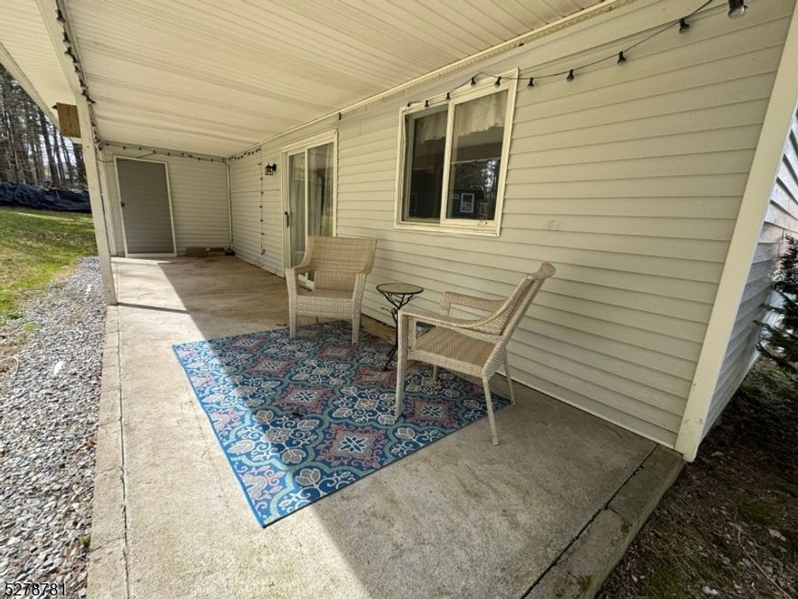 Back on the market with a reduced price! Septic failed, but county has already approved plans to move forward with repairs!! Seller wants an "as-is" sale. Don't miss your opportunity!!! This spacious two story 1/2 duplex of nearly 1,350sqft will not disappoint whether calling it home, or an investment property. The upstairs is complete with two generously sized bedrooms and a shared full bathroom with tub shower. Enjoy the open balcony looking down on the vaulted living room with fireplace! On the first level feel spoiled with an open concept layout! Walking in the front door, be greeted by beautiful vaulted beam ceilings with a view of the dining room, kitchen and living room. To complete the first floor, there is another full bathroom with a corner shower and an office/den/third bedroom. If that is not enough, enhance your living style with not one, but two covered porches; one in front and one in back. Appreciate nature with a morning cup of coffee looking into the woods out back, listening to the birds chirping or out front waiving to neighbors on a morning stroll. This is a truly unique setup in the community that is a MUST SEE!!