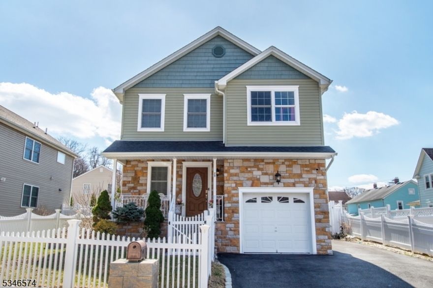 This French-inspired Colonial built in 2016 features 4 Bedrooms, 2.5 Bathrooms, a beautiful Patio and a Fully Fenced-In Backyard making this an Entertainer's Dream! Experience year round comfort with a 2-zone Central Air and Heat system. The Primary Suite includes a Walk-In Shower and Soaking Tub for ultimate relaxation. The unfinished basement is your canvas to create the space you've always wanted. Located steps from Dover High School and close to the train to NYC, shopping, malls, and supermarkets. Make this home yours before someone else does!