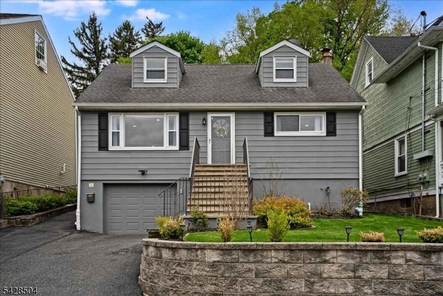 Sunny and bright fully renovated home just steps to everything downtown Morristown has to offer.. Whole Foods, yoga, restaurants, stores, schools, parks, and so much more. NJ Transit train station is less than a mile away!   Fully renovated kitchen and baths, hardwood floors, finished lower level with recreation room, laundry, powder room and access to garage.  One car garage and two-car wide driveway makes parking a dream!   Yard is level, open and fully fenced with extensive landscaping, paver patio, shed, and Rainbird two-zone sprinkler system.  Home has central air, forced hot air, public water and sewer, recessed lighting, Smart Lutron switch/dimmers, new railing going to second floor, and new custom blinds/drapes and blackout shades in primary bedroom   There is so much to say about this home.  It's totally turnkey.