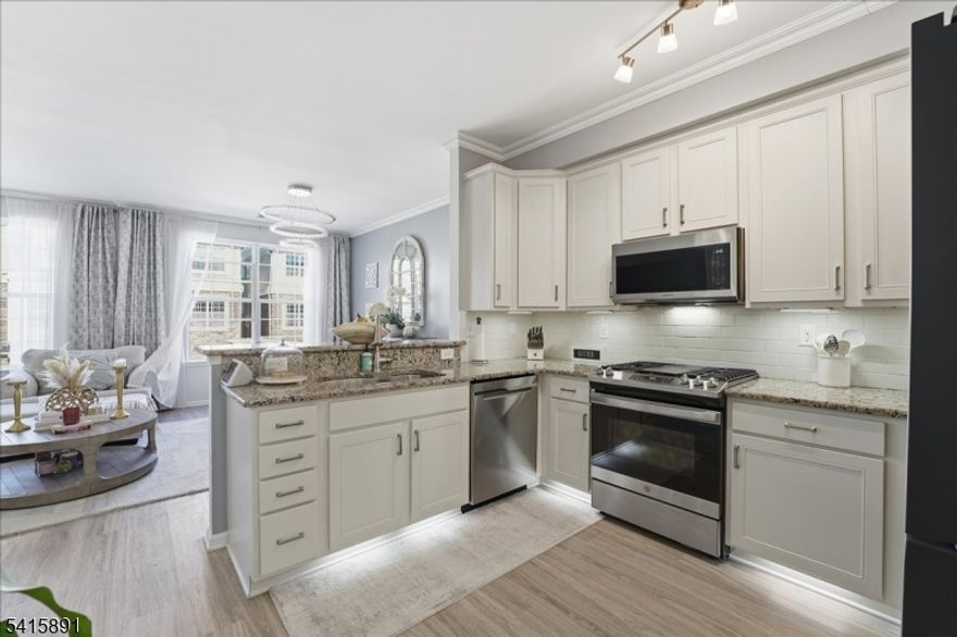 Welcome to one of Coventry Park's most beautifully upgraded homes. This meticulously maintained 3-bed, 2.5-bath townhome has been transformed top to bottom   simply unpack and enjoy. The main level features brand-new laminate flooring, custom crown molding, and abundant natural light. The fully remodeled kitchen boasts all-new cabinetry, quartz countertops, new stainless appliances, and a breakfast bar flowing into a bright, open-concept living and dining area. Upstairs, the primary suite offers a walk-in closet and fully remodeled en-suite bath. The second bedroom features a custom closet system and all bedrooms have new plush carpeting. Second-floor laundry with new overhead storage cabinetry. Every bathroom remodeled with quartz countertops and new fixtures throughout. Additional upgrades include a new hot water heater, whole-home humidifier, water softener, and all-new light fixtures throughout. The attached garage is fully reimagined with tile flooring, ceiling storage racks, and fresh paint. Minutes to major highways, NYC transit, and shopping. Central A/C   1-Car Garage + Driveway   Built 2013.