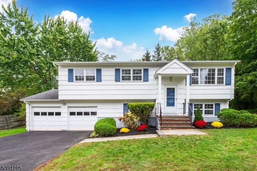 Welcome home to this spacious 4 Bed, 2.5 Bath Bi-Level in a beautiful, private, neighborhood - Original Owner!  This home boasts an Eat-in Kitchen, a Formal Dining Room that flows into a sunny Living Room - all Freshly Painted.  3 Lovely Bedrooms on the First Floor with a Full and 1/2 Bathroom.  A 4th Bedroom is conveniently located on the Ground Floor with an additional Full Bathroom.  In addition, there is a large separate Laundry Room that exits to the beautiful backyard.    Relax in the Family Room that also exits to the patio where you can enjoy endless outdoor entertainment.    Enjoy one of the largest, oversized backyards in this neighborhood and relax in your own private setting.  The Oversized 2 Car Garage enters into the Ground level and provides plenty of storage and space.   So many beautiful updates - brand new walkway and 2025 Driveway & beautifully maintained landscaping.  Convenient 2024 Shed, newer exterior paint and Roof.    This location provides close access to all major Highways, Newark Airport, trains to NYC and all shopping.  Make this home your own with spacious rooms and a flexible floor plan.   With lower taxes, a pristine location and added outdoor space, this home is an ultimate rare find!