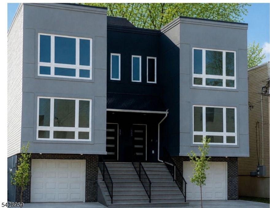 Introducing a standout opportunity to own in one of Essex County's most exciting new construction developments. This modern, attached two-family residence (LEFT side) is thoughtfully designed for today's lifestyle, offering the perfect blend of luxury, functionality, and strong investment potential. This spacious home features 6 bedrooms, 4 full bathrooms, and a private two-car garage, making it ideal for both owner-occupants and investors seeking high-quality rental income. The ground level offers a versatile recreation space with direct backyard access perfect for entertaining, working from home, or accommodating guests. Inside, you'll find sleek, contemporary finishes, appliances, and a clean, modern design that elevates every room. The full rooftop terrace serves as a true highlight, providing a private outdoor retreat with expansive views ideal for relaxing or hosting gatherings. To make this opportunity even more attractive, the seller is offering a buyer credit along with assistance navigating the 5 yr tax abatement process. Additional upgrade packages are available for the rooftop and rec room, allowing you to customize features to suit your style. Conveniently located near major transportation, shopping, and local amenities, this development is positioned for growth and demand. This is more than just a home it's a smart investment and a chance to be part of Irvington's evolving landscape. Schedule your private tour today! Home is virtually staged. Builder's Warranty