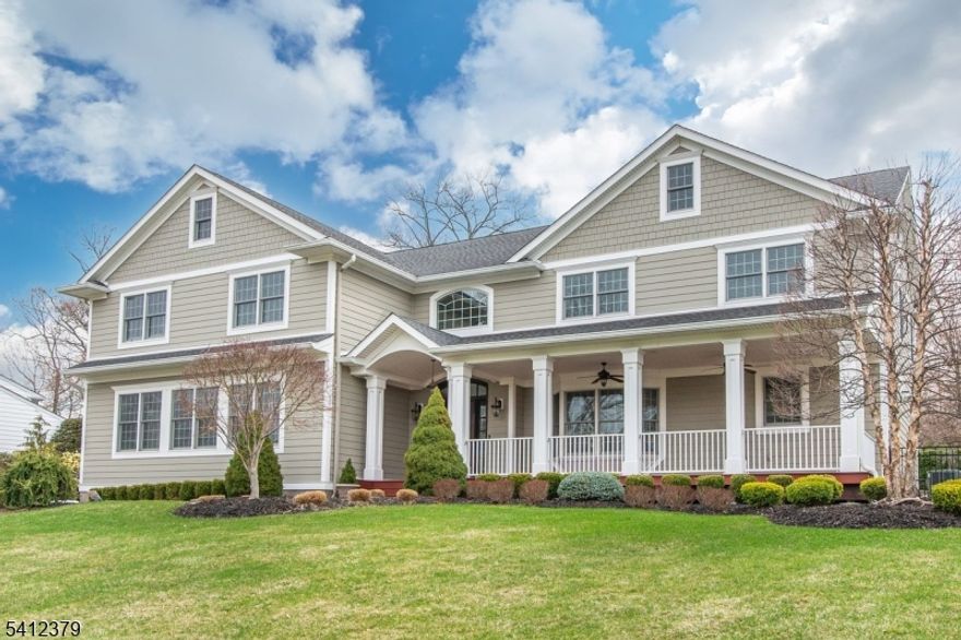 Welcome to this magnificent custom-built home where classic design meets contemporary luxury. Beautifully crafted with impeccable attention to detail, this architectural masterpiece offers a grand lifestyle defined by elegance and serenity! First floor boasts 9 ft ceilings, gorgeous hardwood floors, open concept gourmet kitchen with stainless Thermadore appliances, custom cabinetry and oversized island w/prep sink which flows into family room complete with vaulted ceilings, floor to ceiling stone gas fireplace and French doors to yard. Beautiful formal dining room, convenient home office, grand living room that's bar ready; bedroom w/ensuite and powder room complete the first floor. Stunning hickory floors to 2nd level features a master bedroom retreat! Master bath incl soaker tub, sep shower w/rain head, dual vanity & water closet. The WIC amazes w/built-ins, island w/additional storage & wine refrigerator. There are also 3 additional bedrooms, one w/ensuite, a beautiful main hall bath & laundry room. Lower level consists of den, utility area and garage entrance. Spacious mahogany front porch w/ceiling fans, salt water in ground Gunite pool & 6-person spa & paver patio, Home also includes a Generac generator, central vac, & Anderson windows. Five zone heat, 2 zone CA. Excellent schools, close to shopping, & NYC. You don't want to miss this one! Home warranty included! Pre-approval required before viewing property.