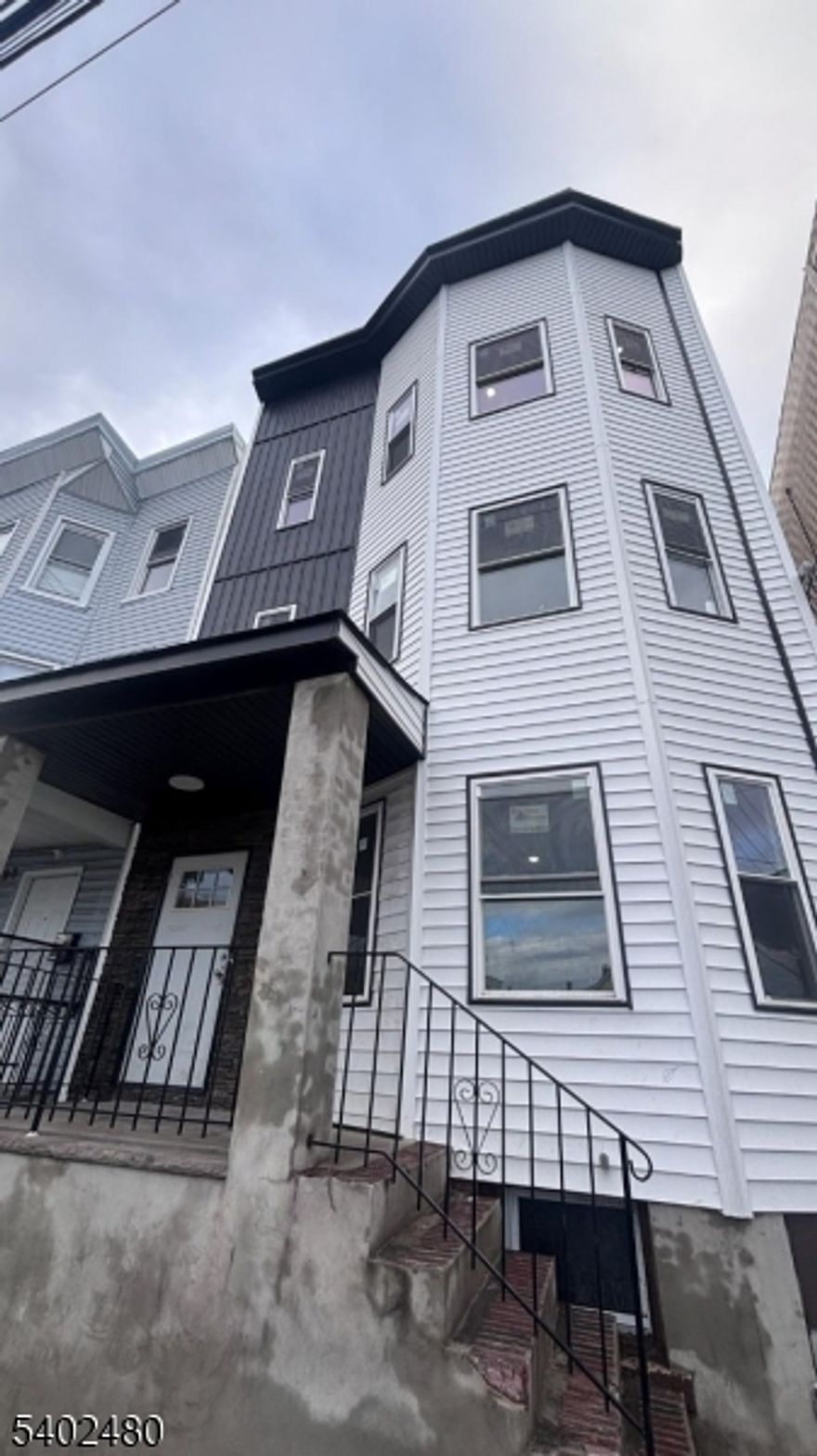 Welcome to this beautifully renovated second-floor apartment in a well-maintained three-family home. The unit features an open-concept layout with central air conditioning and forced hot air heating, offering both comfort and modern living.