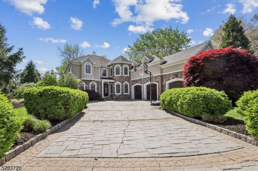 EXQUISITE, ELEGANT & GRAND truly describes this one-of-a-kind custom home & is unlike any other home you have ever seen!  The attention to detail is astounding, complete with the finest of finishes & opulent custom features. This home is perfection a its finest & located on a quaint cul-de-sac in the highly coveted Riker Hill section. Nestled on a lushly landscaped property--the curb appeal with astound!  A gorgeous custom in-layed paver driveway greets you.  Enter into a gracious & grand two story entry that opens to a stunning formal LR anchored w/gas FP & custom built ins & remarkable custom moldings.  LR opens to a stunning glass conservatory overlooking extremely private back yard complete w/pond, outdoor kitchen, paver patio & more--this is an entertainers dream home!  An open gourmet Chef's kitchen w/professional grade appl, gigantic island & open to cozy FR w/FP.  A main level guest suite & wood paneled office w/amazing custom built ins.  The upper level offers lavish primary suite w/octagonal sitting room, spa like bath & boutique style custom closet--stunning!  Each bedroom has custom features that must be seen to believe--there are secret rooms, amazing lighting features, custom in-layed flooring & so much more.  The sumptuous features continue w/the ultimate LL complete w/real theater w/ticket booth, temp. controlled wine cellar, amazing rec room--wet bar & so much more!!   A home with this many exceptional features is a rare & unique find & a must see to believe!