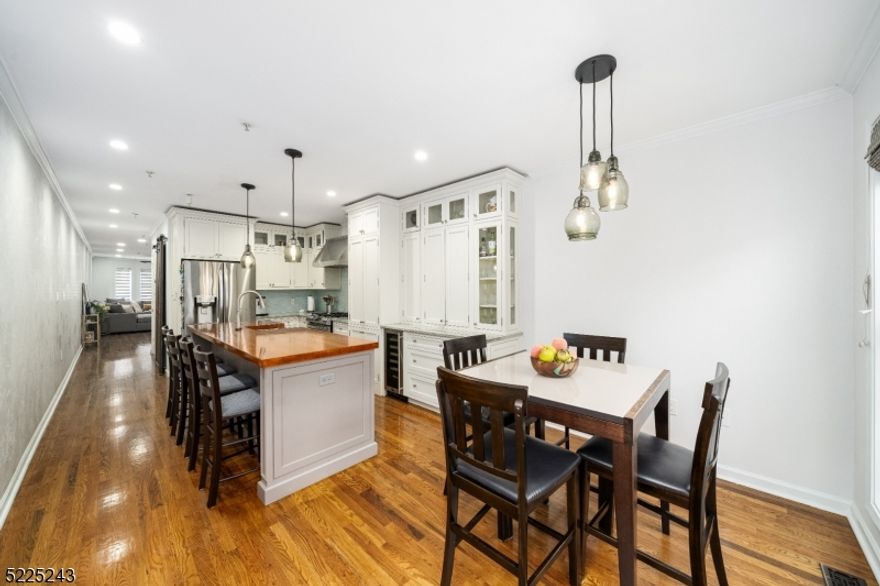 Have you been searching for a large home over 2100 sq. ft, a private backyard and garage parking? Then look no further as this urban townhouse features 4 bedrooms, 3.5 baths with a private garage and lots of outdoor space. The real convenience is being able to drive right into your own 2 car garage, with lots of extra storage and a bonus room currently used as a gym. The main floor has a spacious living room with an updated powder room off living area and kitchen. Enjoy the beautiful custom kitchen, with all high-end new appliances, touch faucet and a large butcher block island. The kitchen is complete with an open eating area. Right off the kitchen you have a deck perfect for grilling that leads you downstairs to your large private yard ideal for hosting gatherings and creating cherished memories. Second floor offers 2 bedrooms, both with new en-suite bathrooms with all high-end finishes. The primary bathroom offers a double sink, a towel warmer and backlit mirror. On the third floor you'll find 2 more bedrooms, another full bathroom, a walk-in closet and a balcony off one of the bedrooms. All 3 bathrooms are fully renovated. In addition you will find; 2 pantries, a full size washer/dryer, multi zone heating/ cooling unit, custom blinds on main floor and 2 additional Juliette balconies from bedrooms with new doors and more. This home is close to 2nd St light rail, parks, restaurants, bus, schools, gyms and more. Make this Urban Oasis yours as dreams can come true.