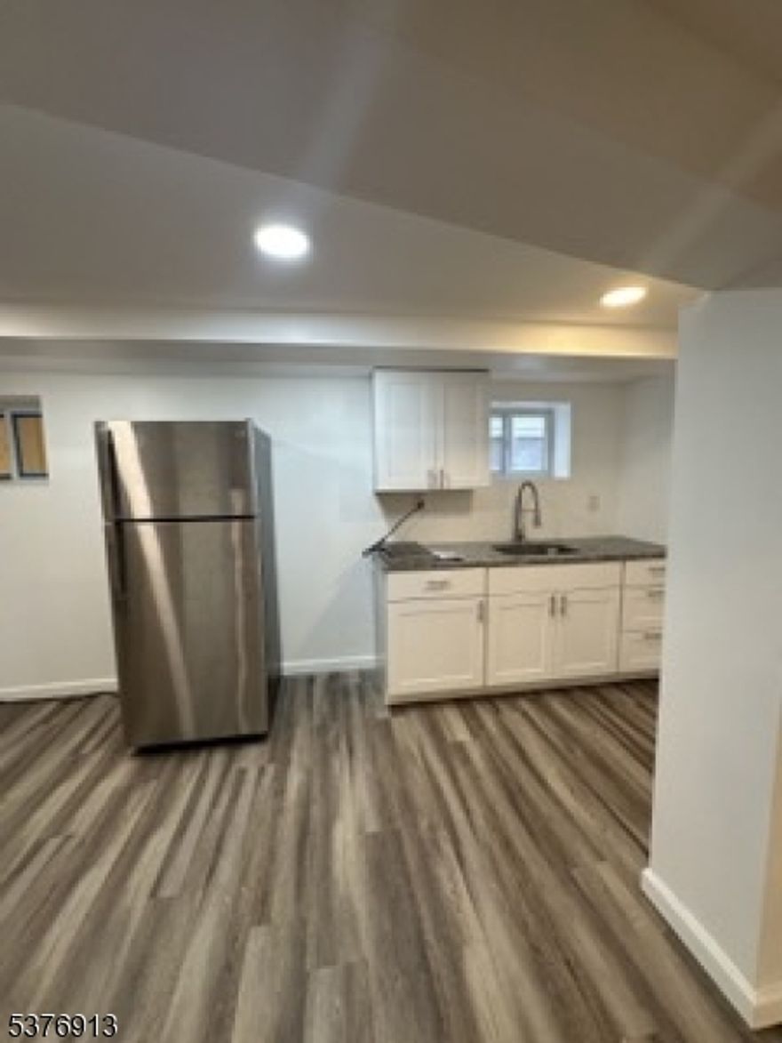 Welcome to a updated Studio 1 bath Unit, Upon entering you'll be greeted with natural light throughout the unit. Kitchen Features a Brand New refrigerator, with a electric Stove and new natural flooring! Updated bathroom! All Utilties included.