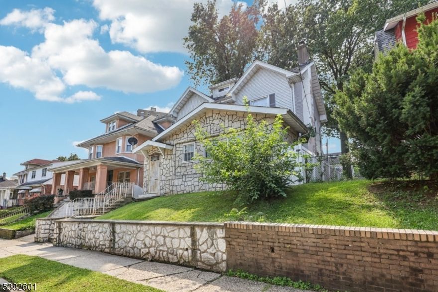 WELCOME HOME! Step into this large, charming, and well-maintained Colonial nestled in the desirable Weequahic section of Newark. This spacious home offers endless possibilities, combining classic character with modern comfort.Inside, you?ll find a bright kitchen, a cozy living room with a fireplace, and a formal dining room, perfect for gatherings. With eight bedrooms and four full bathrooms, there?s more than enough room for everyone. The partially finished basement adds even more versatility, featuring two bonus rooms, a laundry area, and a utility room. Beautiful hardwood floors throughout, a blacktop driveway for convenient parking in the rear Don't miss out on this opportunity to live in a vibrant and thriving community.