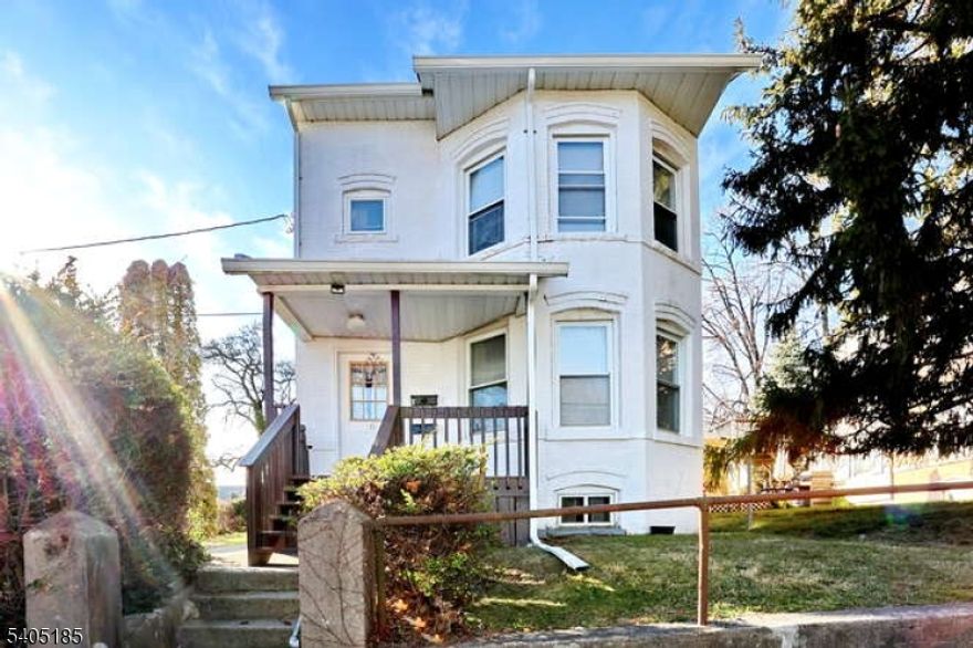 THIS WON?T LAST!  Kick off the new year in this charming 2-bedroom, 1-bath first-floor apartment tucked away in a quiet Hawthorne location. Step onto the inviting front porch, perfect for relaxation, and enjoy the privacy of separate unit entrances. Inside, you?ll find an updated eat-in kitchen with new flooring, modern cabinetry, and stainless steel appliances, plus two spacious bedrooms and a renovated bathroom. The unit also offers a private patio, with shared use of the yard and gazebo. Commuter-friendly?just 5 minutes to the train (main line to NYC/Hoboken). Includes 2 parking spots plus ample street parking. Tenant responsible for all utilities and snow removal. Income & credit verification required. Tenant insurance required. Service animals negotiable. First $150.00 in minor repairs, paid by tenant.