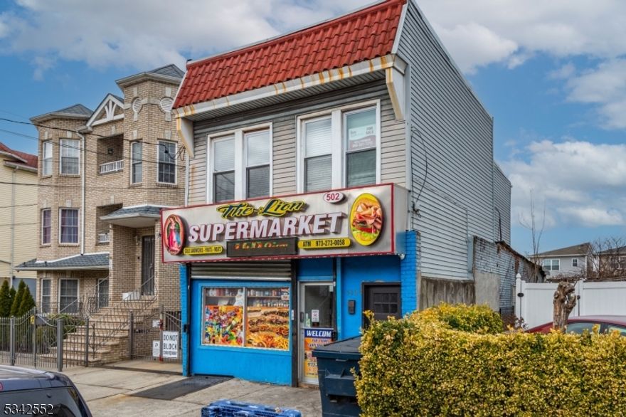 Check out this ready to go Mixed Use Duplex! The first floor unit is tenant occupied with 5 yrs remaining on a 15 yr lease w/a 10 year option. The commercial tenant pays $1,550 in rent currently.  The upstairs  3 BR, 1 bath apartment is renovated and vacant ready to be leased.  This property will require a commercial loan if buyer is using financing.   Seller is motivated!  Amazing location in close proximity to 78.  Come check out this great investment property today!