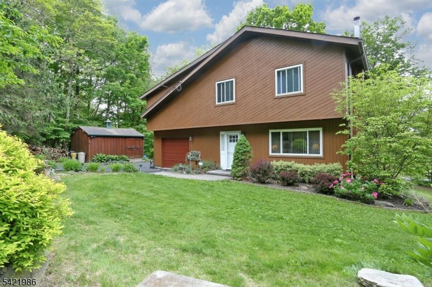 Welcome to this well-maintained 3-bedroom, 1.5-bath home set on a unique combined .75-acre property, including an additional adjacent lot-offering added privacy, space, and future potential. Properties like this are rarely available in the area, don't miss out! Inside, you'll find a comfortable and functional layout with inviting living spaces, enhanced by a wood-burning stove that adds warmth and character (heats the whole house). The home is well-suited for everyday living with updated kitchen and baths, plenty of natural light and the opportunity to make it your own over time. The upstairs family room, in close proximity to the three bedrooms, features Velux Electric Sensor skylights- they close automatically when it rains! Step outside to enjoy the large trex deck overlooking the property, perfect for relaxing or entertaining while taking in the peaceful surroundings. The additional lot creates a natural buffer, providing extra privacy and flexibility not typically found in nearby homes. Additional features include a one-car attached garage, 12 x 16 cedar shed, and a whole-house generator, offering convenience and peace of mind year-round. Whether you're looking for space, privacy, or long-term potential, this property delivers a unique combination of value and opportunity. With seasonal lake views and memebership to Mt. Laurel Lake as well as UGL combined with easy access to Mt. Laurel Park- this location can't be beat!