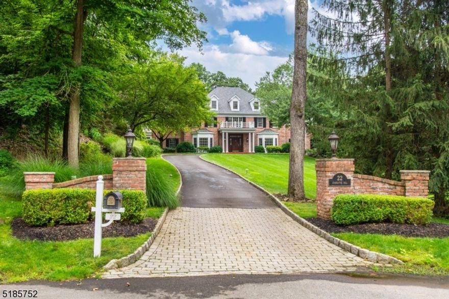 Welcome Home to this stunning Georgian Colonial estate located in a prime cul-de-sac of Bernardsville. This stately home welcomes guests past the curb side brick pillars and up the winding driveway. A grand two story foyer flanks the elegant Dining Room with detailed moldings and Formal Living Room with bay window. The 1st flr also offers a perfect home office with rich woodwork, built ins and fireplace...so comfortable! And, after work enjoy the serene beauty of the Sun Room with gorgeous views of the professionally landscaped and private yard. And, whether entertaining a small or a large group of guests---you will love the stunning white chef's kitchen, huge island, double ovens and so much more. The Kitchen has an open floor plan connection to the Family Room. The Family Room has large French Doors flanking the fireplace and finely finished coffered ceilings. Double staircases lead to the 2nd floor featuring 5 generous sized bedrooms with 4 luxurious bathrooms. The Primary Bedroom is magnificent w Sitting Rm/Fireplace, access to roof top deck, 2 walk in closets and a divine Bathroom. The Lower Level will truly delight all! Special features are the finely finished wine and tasting room, the Game Room, the Media Room, a Bonus Rm next to a full bath, and a gym, along with lots of storage. Oversized 3 car garage. This home has it all, plus an easy drive to town and train!