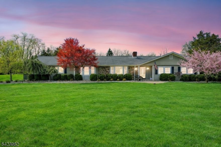 A commanding presence w/ dynamic curb appeal sets the tone, enhanced by professional landscaping & specimen plantings, creating an immediate & lasting impression. The home's striking blend of Hardie board & stone siding further elevates its timeless appeal, seamlessly complementing the exterior design. Inside, every room flows w/ intentional grace, revealing an exceptional floor plan tailored for customized living. An expansive gourmet-inspired Kitchen w/ SS appl., granite tops & seamless connectivity to the main living spaces anchors the open concept layout. Crisply renovated bathrooms add a layer of refined comfort throughout. A remarkable 24x24 Family Rm addition offers an impressive extension of living space, mirrored below by a thoughtfully expanded lower level, both offering access to the outdoors. The finished lower level is exceptional in scale & versatility, feat. a Great Rm w/ Wet Bar, Rec Rm, Exercise Rm, Full Bath & ample storage. Relax in your own backyard escape complete w/ an in-ground pool surrounded by cool decking, estate fencing & an inviting paver patio, all perfectly suited for relaxation & entertaining. Energy efficient windows & three independent HVAC systems ensure year round comfort & efficiency. A driveway extension delivers full lower lvl access along w/ addl. parking. Set along a desirable cul-de-sac street & framed by a picturesque country setting, this home showcases a highly coveted floor plan w/ an enduring presence that is certain to impress.