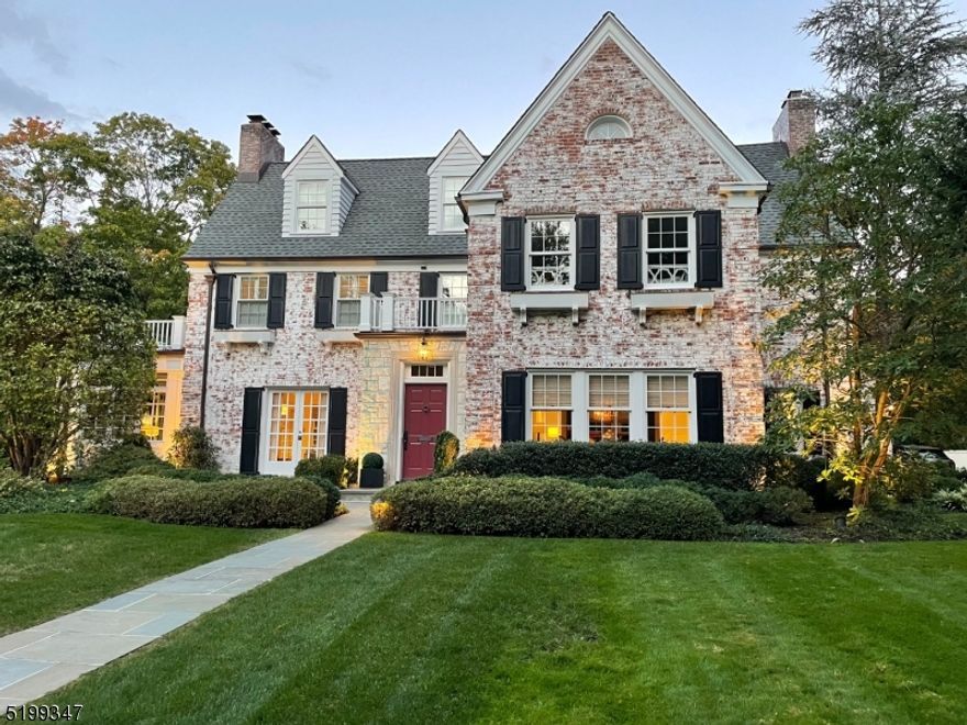 MAGNIFICENT BRICK COLONIAL * AMAZING CHESTNUT PLACE LOCATION! * A rare opportunity to own your dream home on the most coveted street in Short Hills. This home boasts an easy-flowing floor plan w/ an inviting entrance, elegant living room with fireplace, formal dining room, 1st flr library/office & open-concept family room that flows into the gourmet kitchen, breakfast area w/ banquet seating, powder rm, laundry rm and back entrance w/ mudroom & garage. State-of-the-art kitchen has SS appliances (Wolf, Sub-Zero, Asko), two dishwashers, a beverage refrigerator and center island w/ marble counters & bar seating -- perfect for today's living! Custom and designer light fixtures throughout. Upstairs, 6 spacious BRs plus an exercise rm includes the primary suite -- a sunlit rm w/ fireplace, walk-in closet and a luxurious marble bath w/ double vanity & glass shower. LL: expansive rec rm w/ natural light and a tricked-out wine cellar. Main space flows effortlessly to the bluestone patio with grill that overlooks the professionally landscaped property w/ extensive landscape lighting. 2000kw generator, Ring doorbell/entry system, new HVAC, Nest thermostats, Sonos-ready, underground sprinklers, wide driveway w/ Tesla & Audi EV Chargers. WALK TO EVERYTHING: Short Hills station for NYC trains (0.5miles), Arboretum & all top-rated Millburn schools, including Glenwood Elementary. A wonderful retreat in a fantastic location with every modern amenity--this custom luxury home is a WOW!