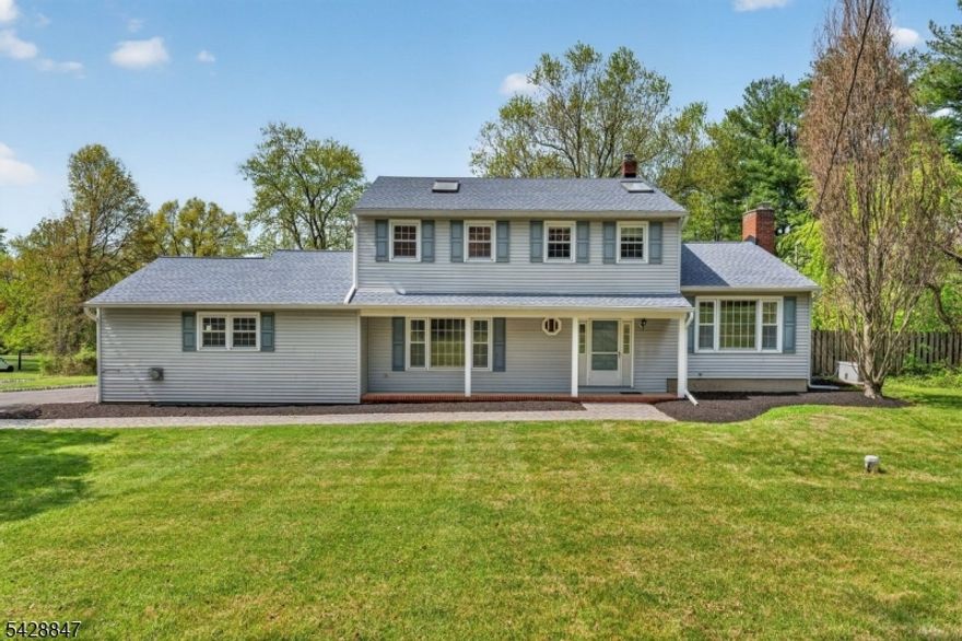 Set on 1.35 acres in highly sought-after Martinsville, this expansive 5 BR, 4 full & 1 half bath home offers exceptional space, flexibility & thoughtful updates throughout. Built in 1968 w/ an addition in 2000, it blends classic charm w/ expanded living. A paved driveway w/ Belgian block border, paver walkway & side entry welcomes you. The layout features a 1st fl primary suite w/ WIC, custom shelving, HW floors, high ceilings & private ensuite w/ stall shower & separate water closet. The kitchen offers a center island w/ prep sink, SS appliances incl Thermador gas oven, built-in microwave, Bosch refrigerator & breakfast area w/ access to a large deck w/ PVC railing & NG grill hookup. The home includes DR, 1st fl office & a light-filled FR w/ skylights, built-ins, surround sound, recessed lighting, HW floors & gas log FP (Heatilator) w/ marble surround; separate LR w/ wood-burning FP. Finished basement spans original home & addition, incl walkout LL w/ rec, exercise & leisure rooms + utility area. Outdoor features incl 10x20 shed & IG pool (as-is, not recently opened). Add'l highlights: 1st fl laundry w/ cabinetry & sink, pantry, heated 2-car garage, central vac, whole house fan, attic space & 30kW generator. Newer roof (2020), most windows replaced, newer HWH. 3 FHA systems, 2 CAC. Public sewer, well water. Approx 3,597 sq ft. 2 basements (orig + addtn); walkout LL 1st fl laundry w/ sink, cab; W/D incl.  Pantry. 2-car heated gar w/ openers. Central vac. 3 FHA; 2 CAC. units