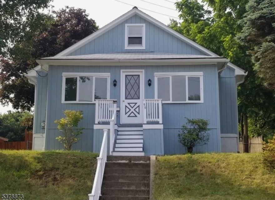 Cape Cod on a 50x150 lot with major updates already completed! New roof (2021), new hydronic boiler and 50-gal water heater (2022), new carpet and vinyl tile. Main level offers 3 bedrooms and full bath with laundry. Upstairs features a private oversized bedroom with storage. Enjoy the family room with wood-burning fireplace, half bath, and access to a large deck and fenced yard. Full basement ready for your finishing touches. Bonus 12x16 shed with electricity and work benches. Off-street parking in front and shared lot in back of home. Perfect turnkey investment or affordable first home with room to grow. AS-IS. Subject to Short Sale bank approval.