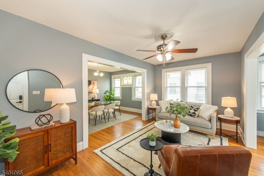 THIS ONE, IS SPECIAL! Spacious, sun-filled, and truly move-in ready two-family home located on a coveted and quiet one-way street in Bloomfield's desirable Fairview section. This bright, turn-key property offers flexible living and incredible income potential.The first floor unit features a sunny living room connected to a charming sunroom, a formal dining room, and an eat-in kitchen with stainless steel appliances and wine fridge. Two nicely sized bedrooms and a renovated full bath complete the space. This unit includes exclusive access to a walk-out basement with private washer and dryer and endless storage and\or possibilities.The second unit spans two levels and can be reached by two sets of stairways-front and back for convenient access.The second floor offers a bright, modern open floor plan with a living\dining combo with an electric fireplace and an expansive sunroom/bonus room. A fully equipped eat-in kitchen, two bedrooms and a full bath. The upper level features a large open loft with a third bedroom and a spacious updated full bath ideal for a primary suite, recreation space or home office. Additional highlights include NEST thermostats, new windows, a two-car garage, private driveway, and deep backyard with patio area and fire pit. Conveniently located steps away to Fairview Elementary School, close to major highway access and Bloomfield's NYC train and vibrant downtown. An incredible opportunity for both investors and owner-occupants. THIS ONE, IS A MUST SEE!!