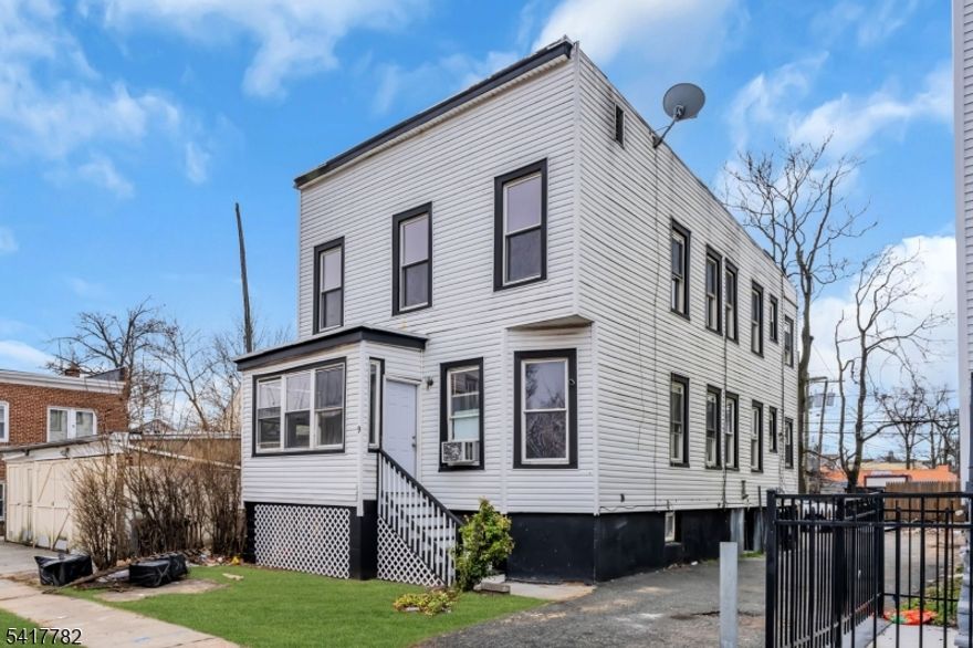 This beautifully redone two-family home is move-in ready and perfect for end users or investors! Unit 1 offers 7 rooms, including 4 bedrooms, 2 full baths, a bright living room, a stunning modern kitchen with new appliances, a dining area, and a full basement for extra living space. Unit 2 features 6 rooms with 3 bedrooms, 2 full baths, a welcoming living area, and a stylish new kitchen. Additional highlights include ample driveway parking that can accommodate 7+ cars, a rear yard, tasteful updates throughout, and a layout that combines charm, functionality, and modern comfort?truly an exceptional opportunity for a turnkey property.