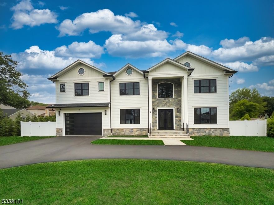 This New Construction luxury home, built with a new foundation, totals approximately 6,700sqft when including the fully-finished basement and garage. This home has six bedrooms, each with a full bath and five of them have at least one walk-in closet. The primary bedroom has a spa-like ensuite, tray ceilings, and two large walk-ins closets. Upon entry, a dramatic 2-story foyer flows well to each room on the main level. The first-floor features 10ft ceilings, 8ft doors, 2-story family room, a formal dining room, powder room, a large bedroom with ensuite and walk-in closet, a versatile bonus room/office, and separate wet and dry bars. The high-end kitchen includes a massive center island, custom cabinetry, and walk-in pantry. Upstairs you will find 9ft ceilings, four generously sized bedrooms, a laundry room, and a balcony overlooking the family room. The fully-finished 2,000sqft basement adds more living space with a large rec room, media room, a bedroom with a nearby full bath and nice double door closet, summer kitchen, bonus room and 9ft ceilings. Set on a nearly 100 x 200 lot, the home includes a circular driveway, gated fence, and large backyard. Additional features: custom hardwood floors, stylish millwork, generator hook-up, and smart garage. Close to top schools, highways, shopping, and bus or train access. Newly built homes of this size and quality on a large flat lot are a rare find. 10-year warranty.