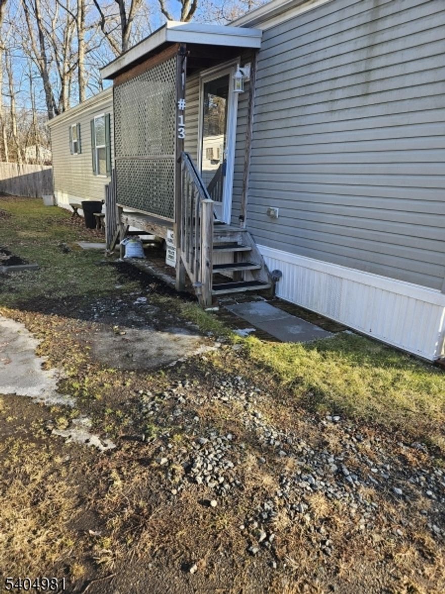 Mobile home. Lessee must be approved by Lozier's Court LLC. Land is leased for $500.00 monthly includes property tax, trash, recycling and snow removal. Local to shopping, Rt 23 and Rt 15. Financing not available. CASH OFFERS ONLY.  Refrigerator, Stove, Microwave, Dishwasher, Washer and Dryer included. Natural Gas, Central AC. Carpet in the Bedrooms. Driveway can park one car and one car in front of Mobile home.