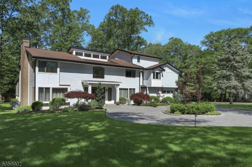 WOW! Luxury Living on a Grand Scale " Elegantly Renovated 5+ Bedroom Estate with Cottage. Absolutely Stunning! Step into the main level designed for both grand entertaining & everyday comfort. 2 story foyer welcomes you & leads to A spacious formal living room W/Fpl, Formal dining room & a warm great/Family room w/ vaulted ceiling & Fpl create a seamless flow for gatherings. The sun-drenched sunroom offers a peaceful retreat, while the stunning gourmet kitchen complete with a large island, top-tier appliances & a butler's pantry is a chef's dream. Upstairs, you'll find five generously sized bedrooms, including a luxurious primary suite featuring its own fireplace, spa-like bath, sauna & walk-in closet.  comfort is never compromised. A private office & 6th bedroom on the third level adds flexibility for working from home. Approx 4900 Sq ft plus a finished basement that expands more living space with a spacious recreation room, perfect for movie nights, games, or fitness. Outside, enjoy one acre of meticulously manicured grounds, a three-car garage & a charming, detached cottage ideal for a pool house, guest suite, or studio. Many upgrades also incl: Hardiplank siding, sprinklers, central vac, water softener,  3 FPL, 3 car garage & more. Located in a highly sought-after neighborhood with top-rated schools & unbeatable access to shopping, dining, & commuting routes, A bright, welcoming home filled with warmth & Love. It offers luxury lifestyle & location all in one.  A TRUE GEM!