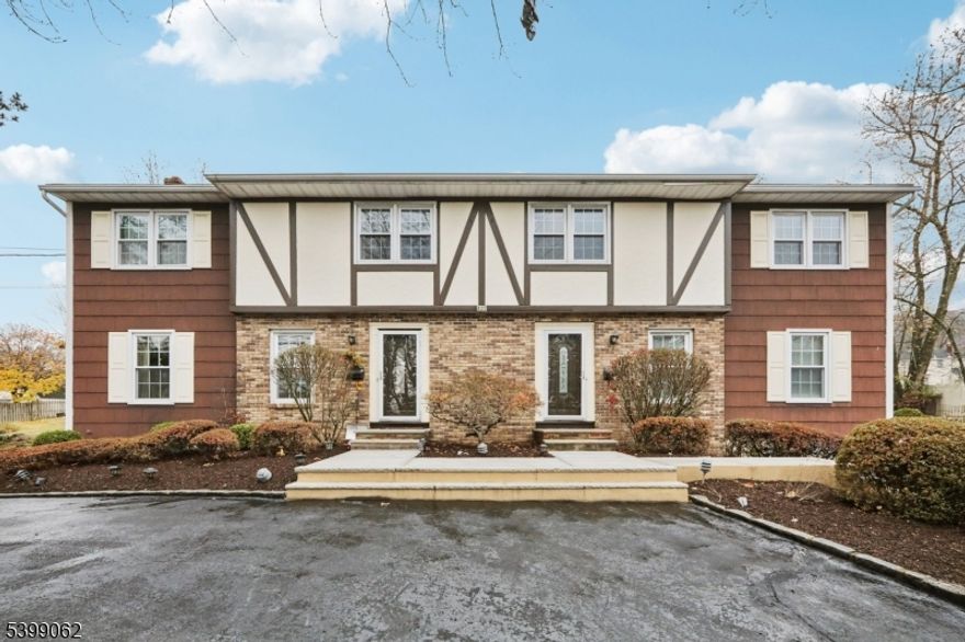 Spacious Totally Renovated Custom Tudor-style duplex offering identical main-level layouts on both sides, featuring a Living room, Formal Dining room, Modern Eat-in kitchens with newer updates and sliders to patio, custom trim, recessed ceilings with ambient lighting, plus Powder room and Laundry room. The second floor includes Master Bedroom with a walk-in closet and Master Bath, along with two additional Bedrooms and updated Full Bath. The right-side unit offers a finished basement with a recreation room, utility room, and a half garage that can be converted back to a full-size garage. The left-side unit features a finished basement with a separate entrance, Summer Kitchen, Living room, Bedroom, and a newly renovated Bathroom with a Jacuzzi tub. Additional highlights include a circular driveway, spectacular oversized property that's 276 feet deep, private fenced in yard that's perfect for entertaining, and is located in a prime location just steps from NYC transportation, schools, and the town center!