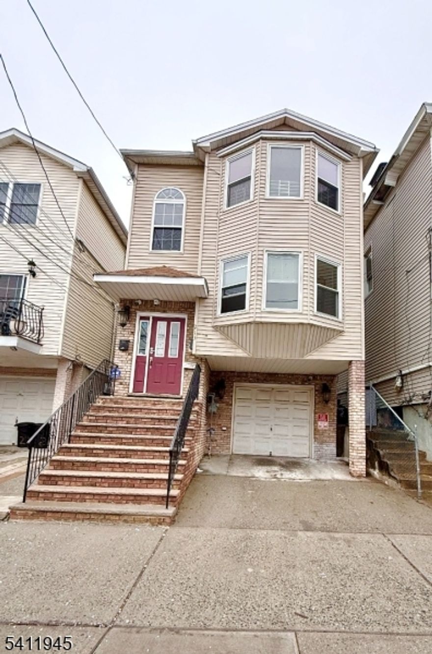 Beautiful 1st floor and ground level apartment for rent in excellent condition located in the Peterstown section of Elizabeth. This well kept residence offers 3 bedrooms and 2 full bathrooms, hardwood floors throughout, and central air for added comfort. The layout is bright and practical, with a welcoming living area and a formal dining room that give the home a natural, open feel without feeling crowded.The kitchen is in very good condition with stainless steel appliances and connects comfortably to the main living spaces, making the layout functional and easy for everyday living. From the main level there is access to a deck, and a shed is included for additional storage.The ground level features a nicely sized extra room, a newer second kitchen, and a full bathroom with its own private entrance, creating a flexible setup that works well for a mother-daughter style arrangement or for anyone needing additional living space.One parking space is included with the apartment at no additional cost. A separate parking agreement will be provided for parking use.Conveniently located near schools, shops, restaurants, parks, and public transportation.